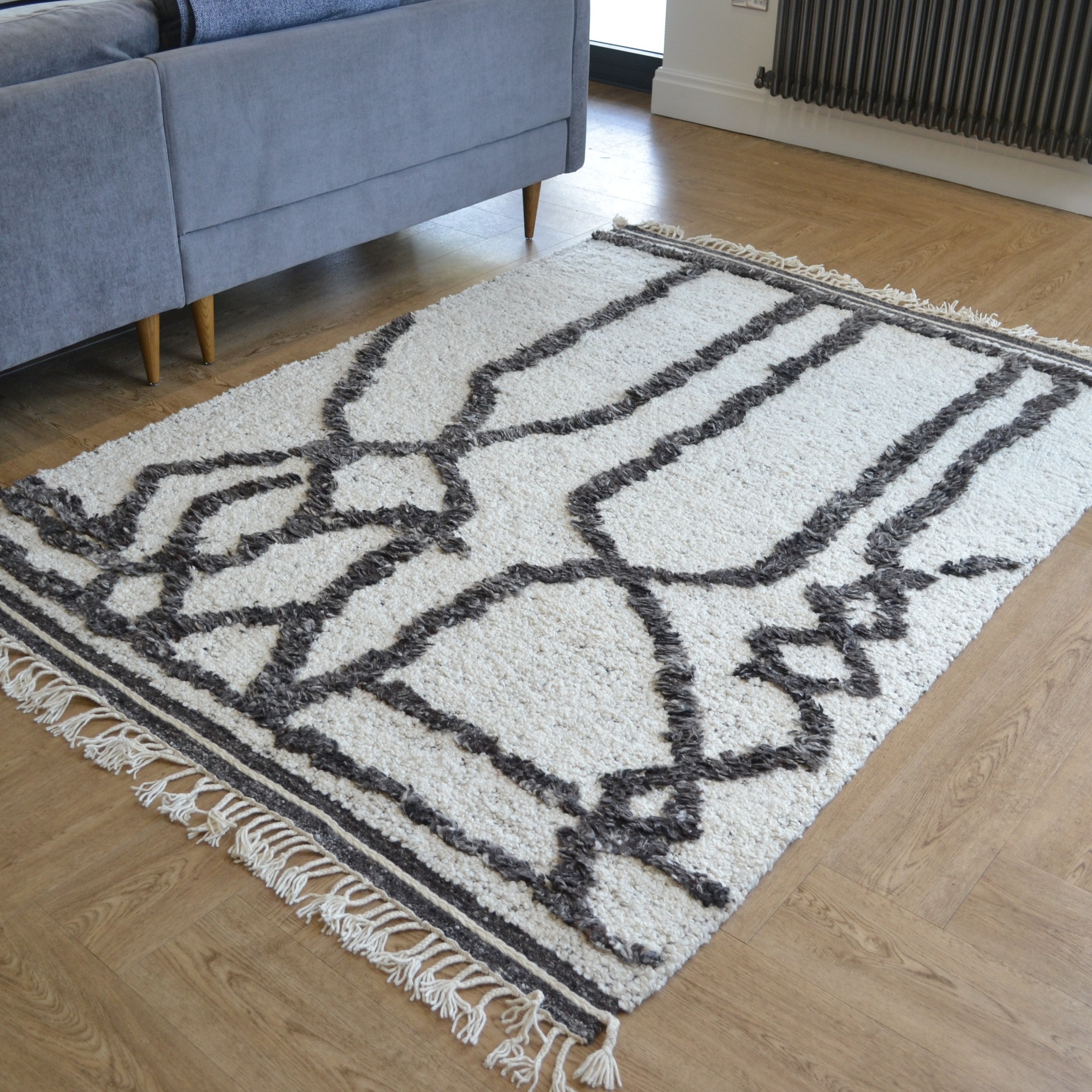 Malaga Textured Abstract Wool Rugs In Ivory Charcoal